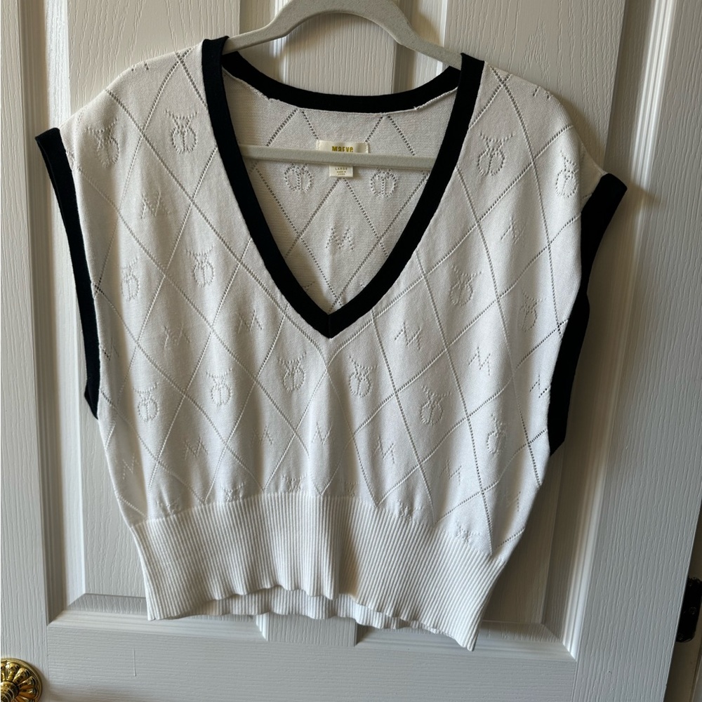 White sweater vest
